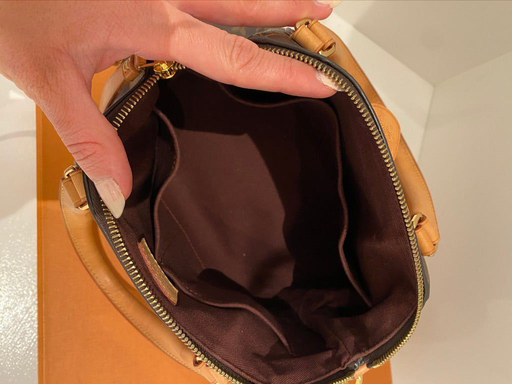 Louis Vuitton Monogram Rivoli PM Taske